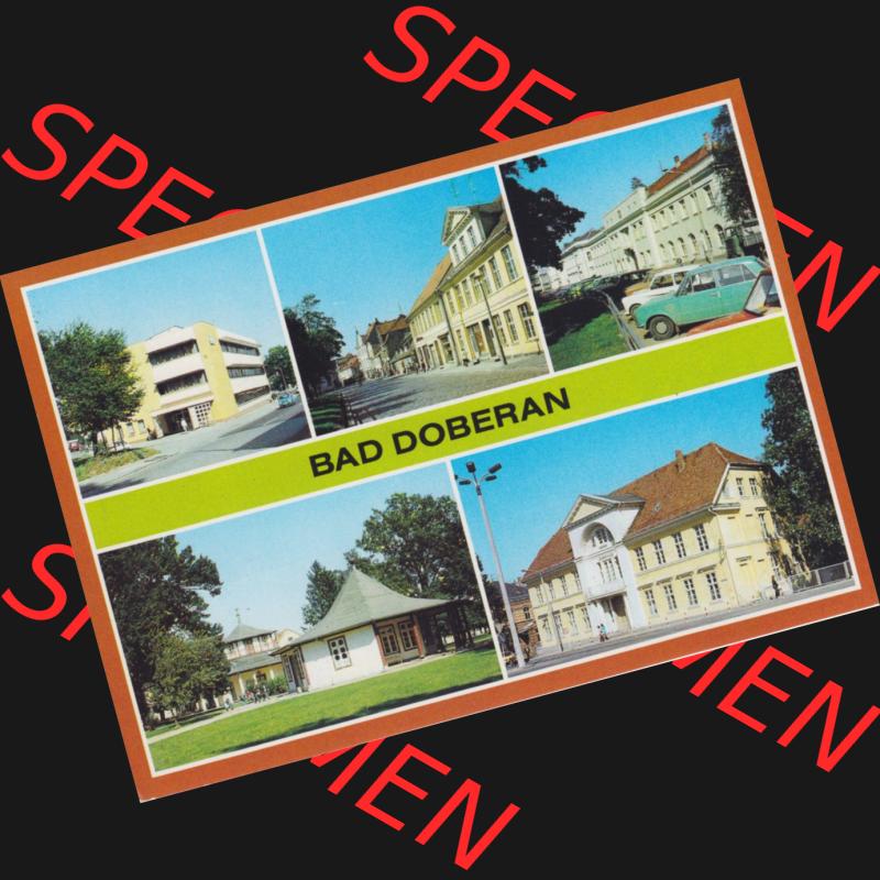 Alte Ansichtskarte der DDR Bezirk Rostock, Kreis Bad Doberan, Stadt Bad Doberan 1984, Dienstleistungskombinat, Rostocker Straße, Am Kamp, Lessingoberschule.... Sammlung